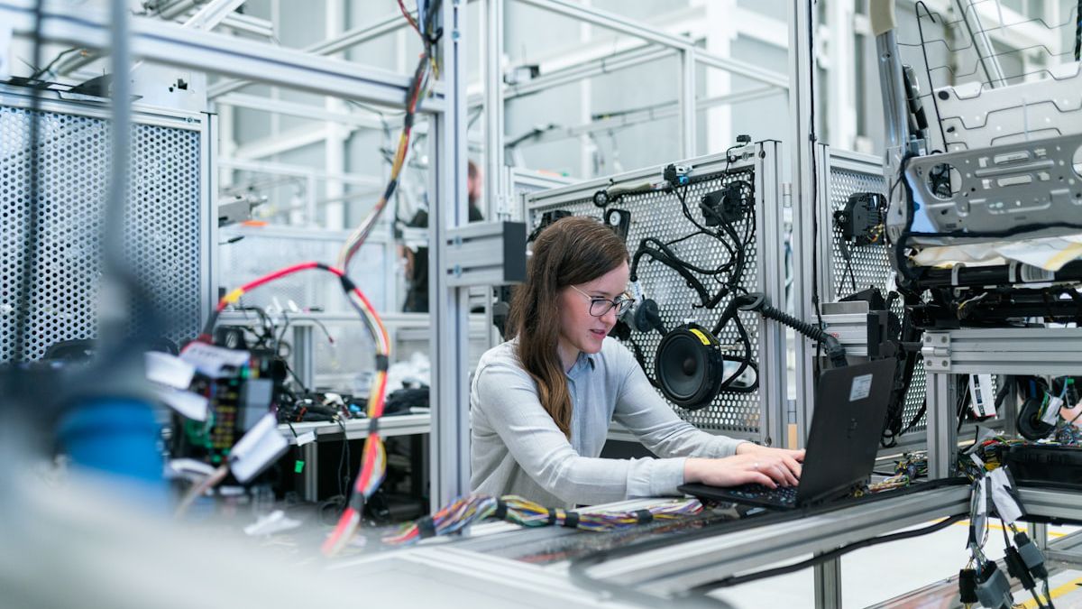 Engineer working at a precision machine
